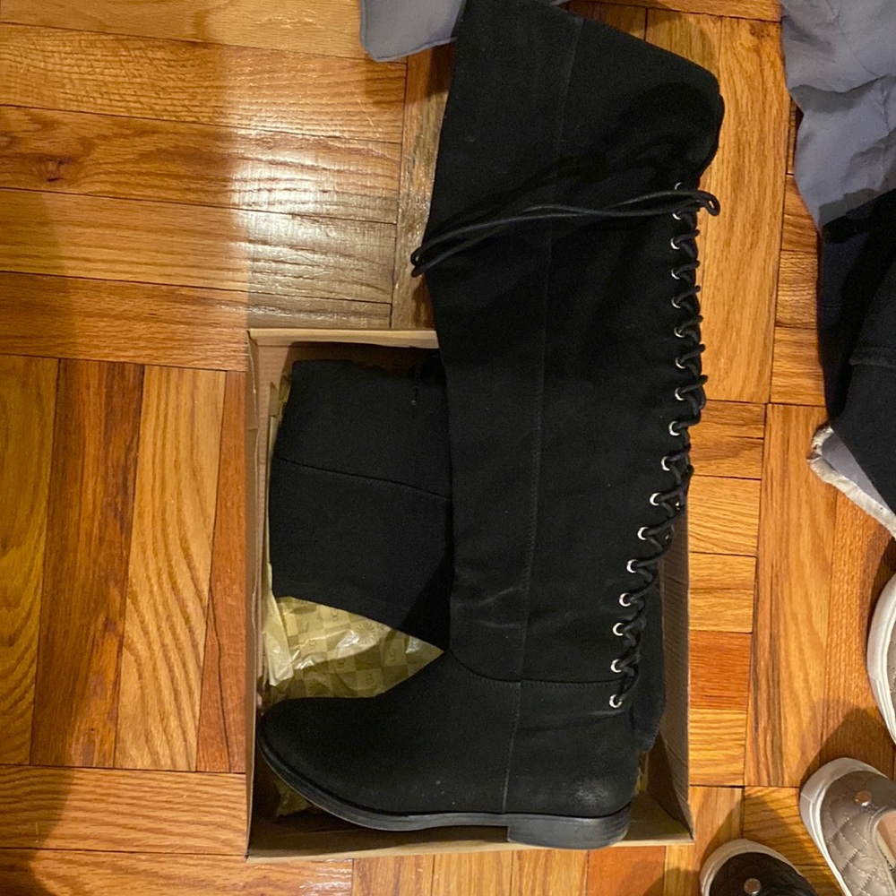 Over the knee flat black boots